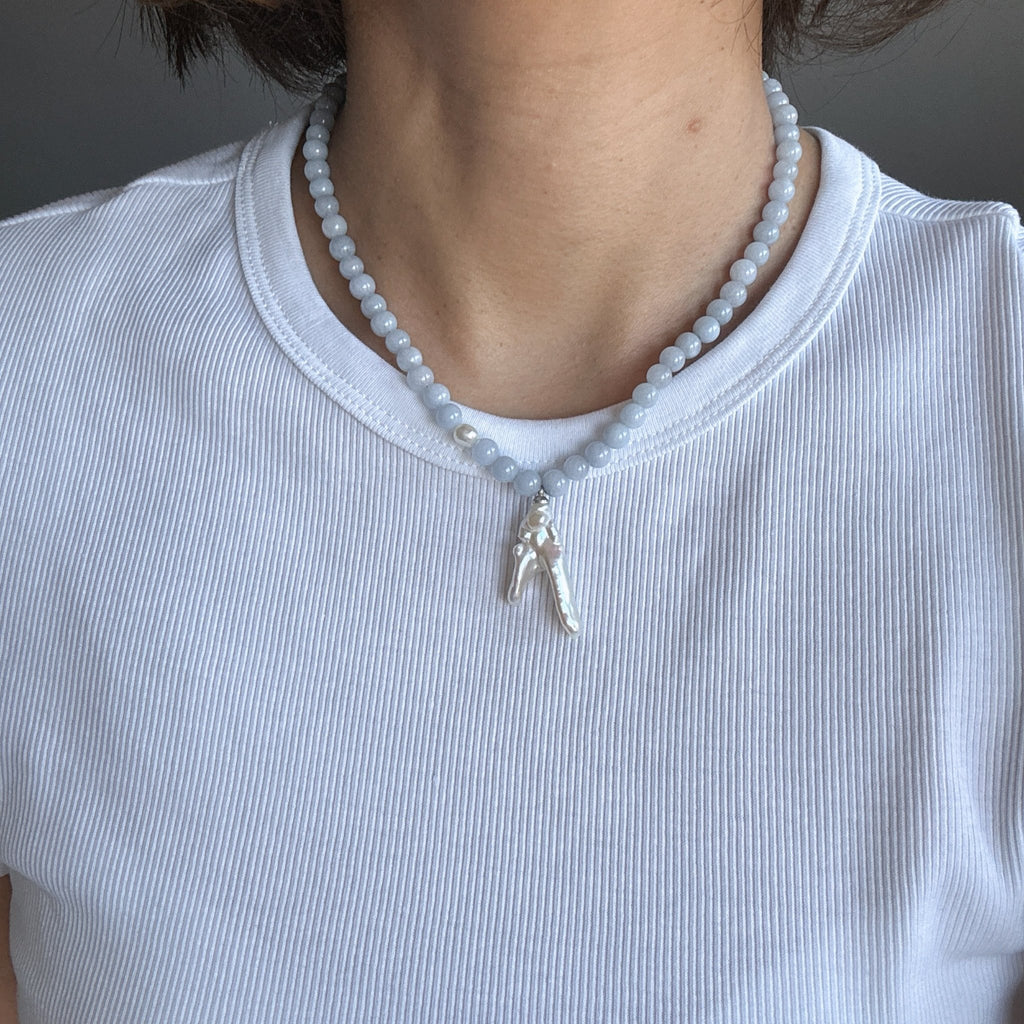 Model wearing Azure Muse Blue Chalcedony & Freshwater Pearl Necklace