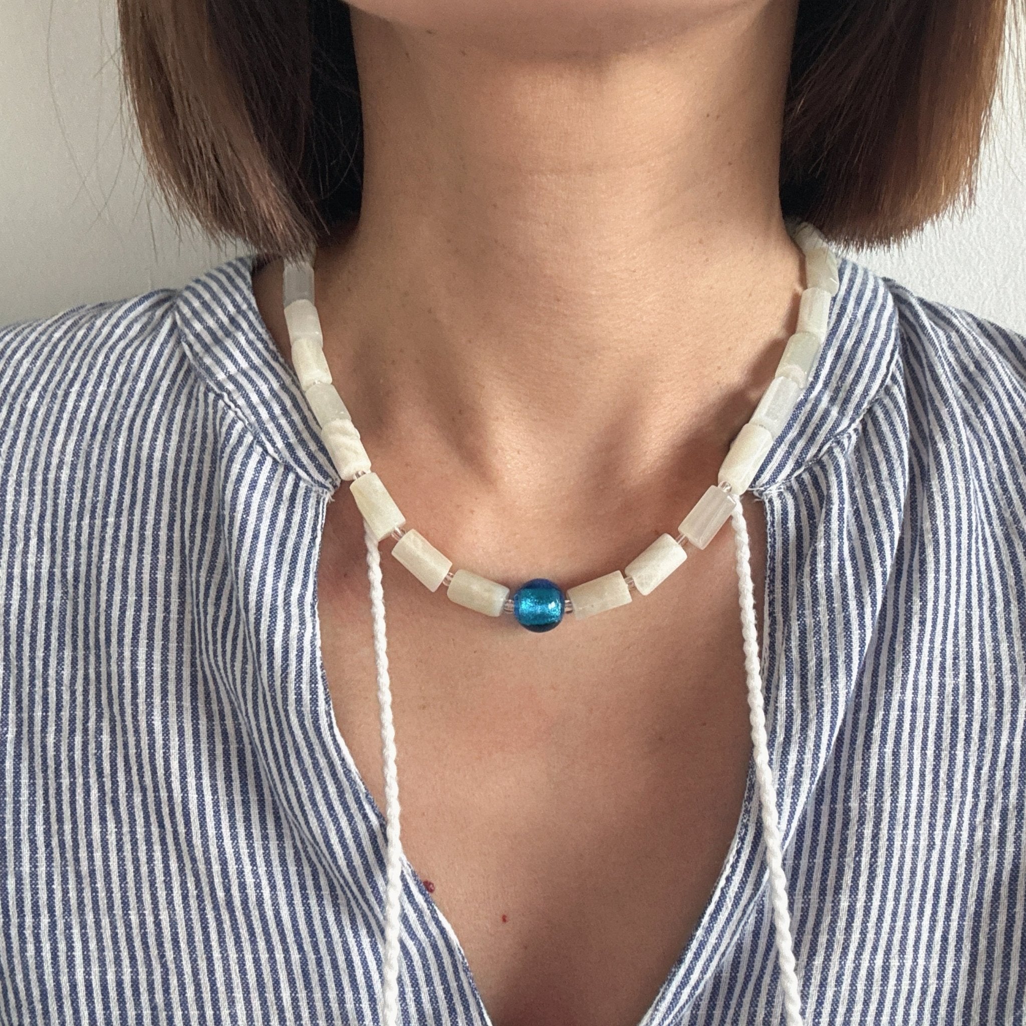 Model wearing Blue Dot Necklace
