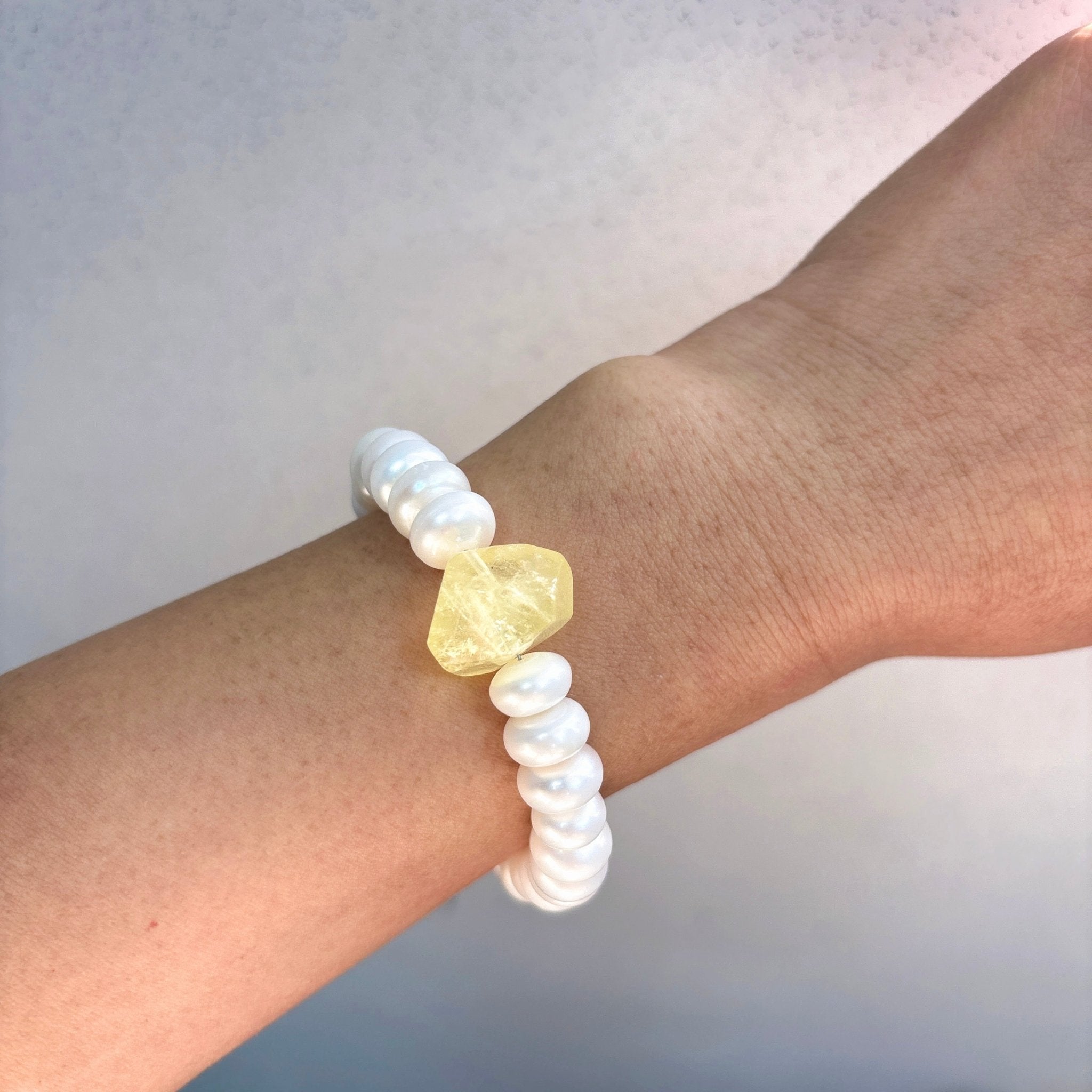 Model wearing Earth Light Freshwater Pearl & Natural Stone Bracelet