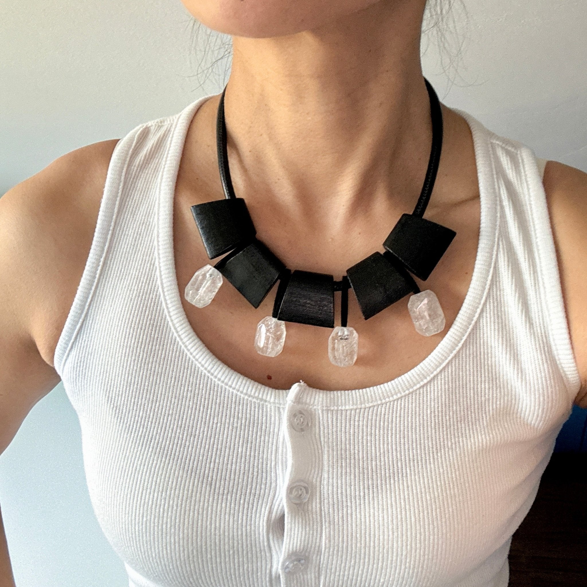 Model wearing Earth Light Wood and Crystal Pendant Necklace