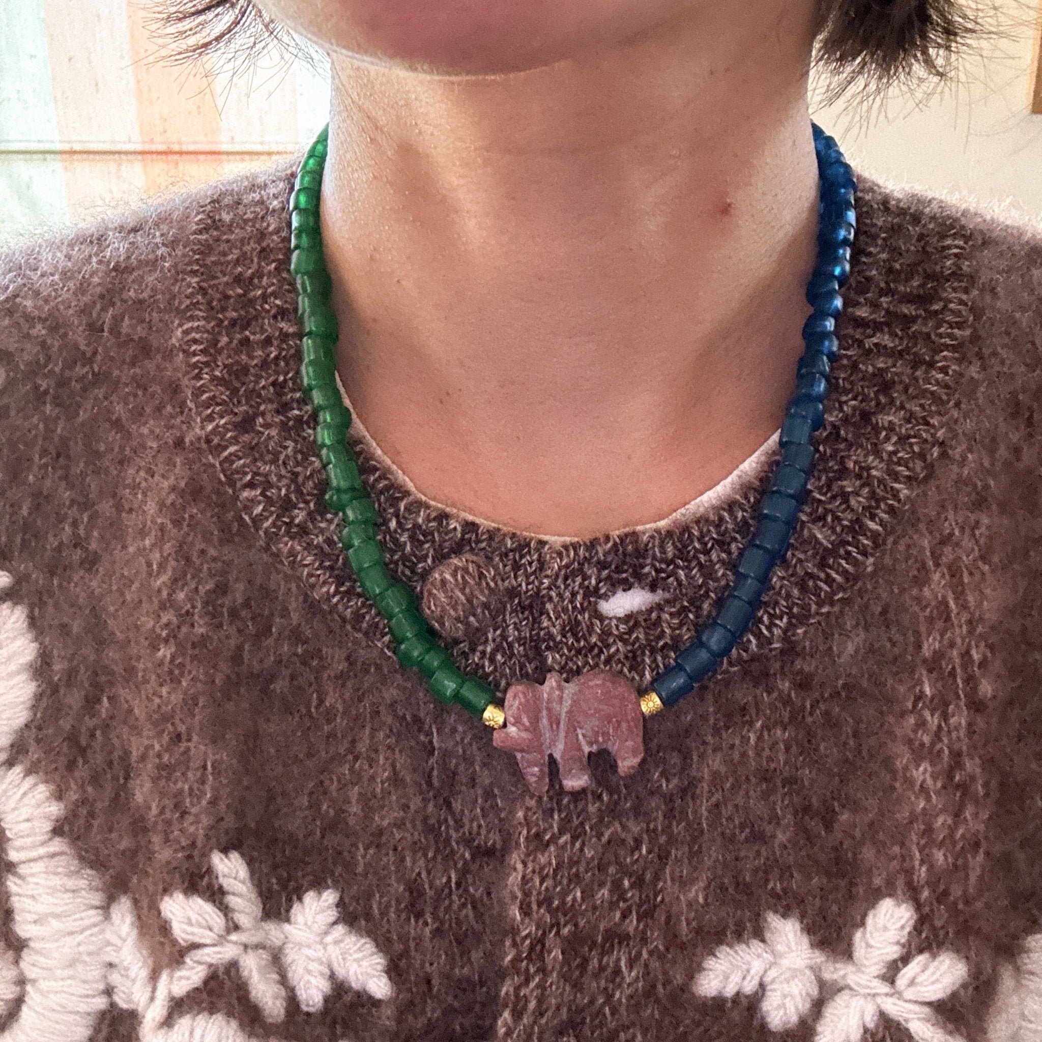 Model wearing Elephant Tide Glass Bead with Natural Stone Ruby Elephant Charm Necklace
