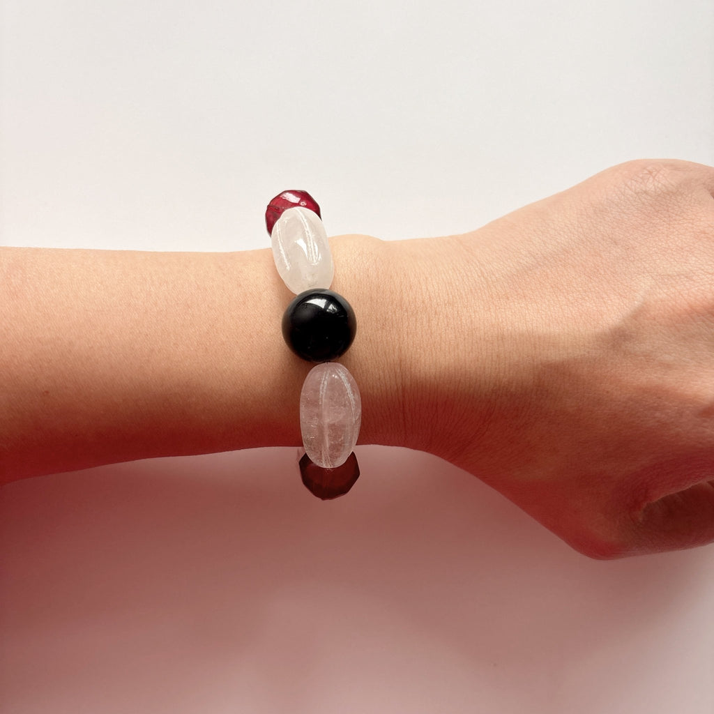 Model wearing Heartline Crystal and Black Agate Bracelet