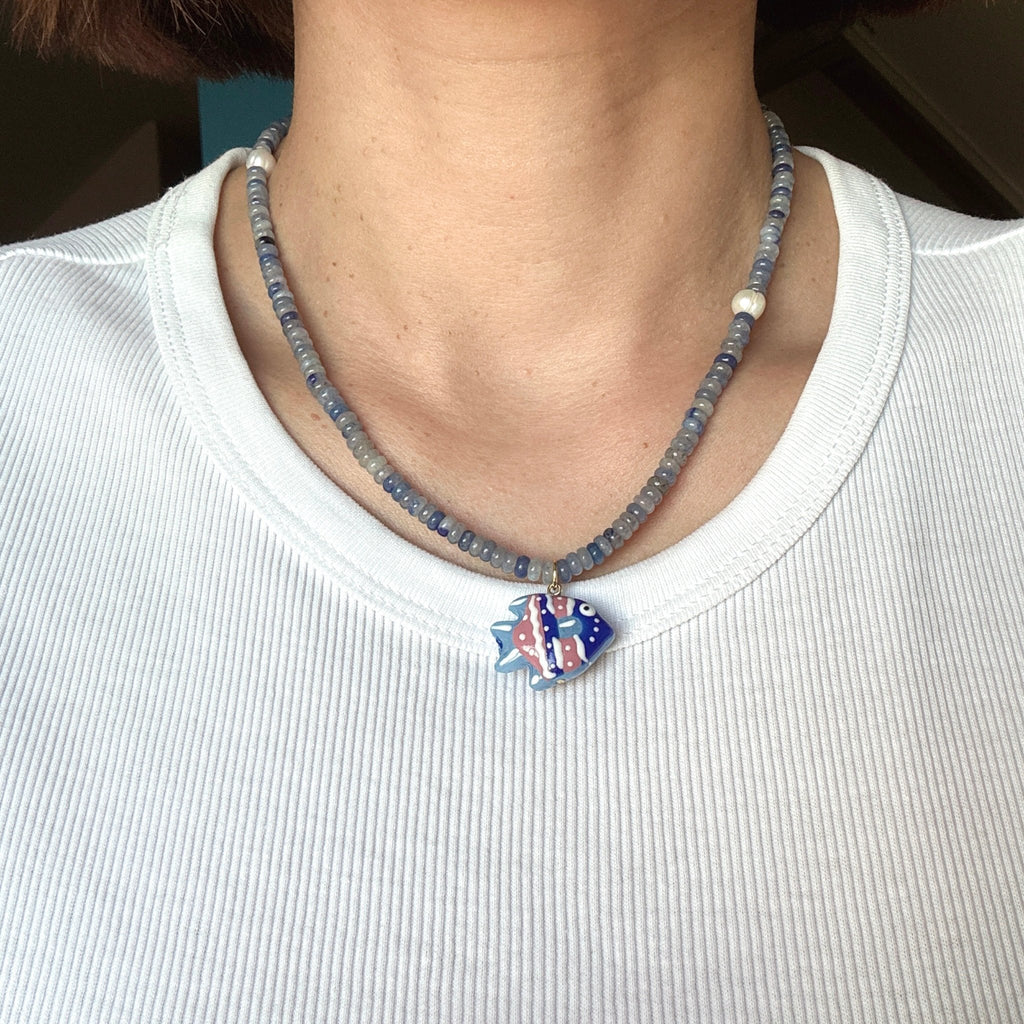Model wearing Ocean Fish Pendant Necklace