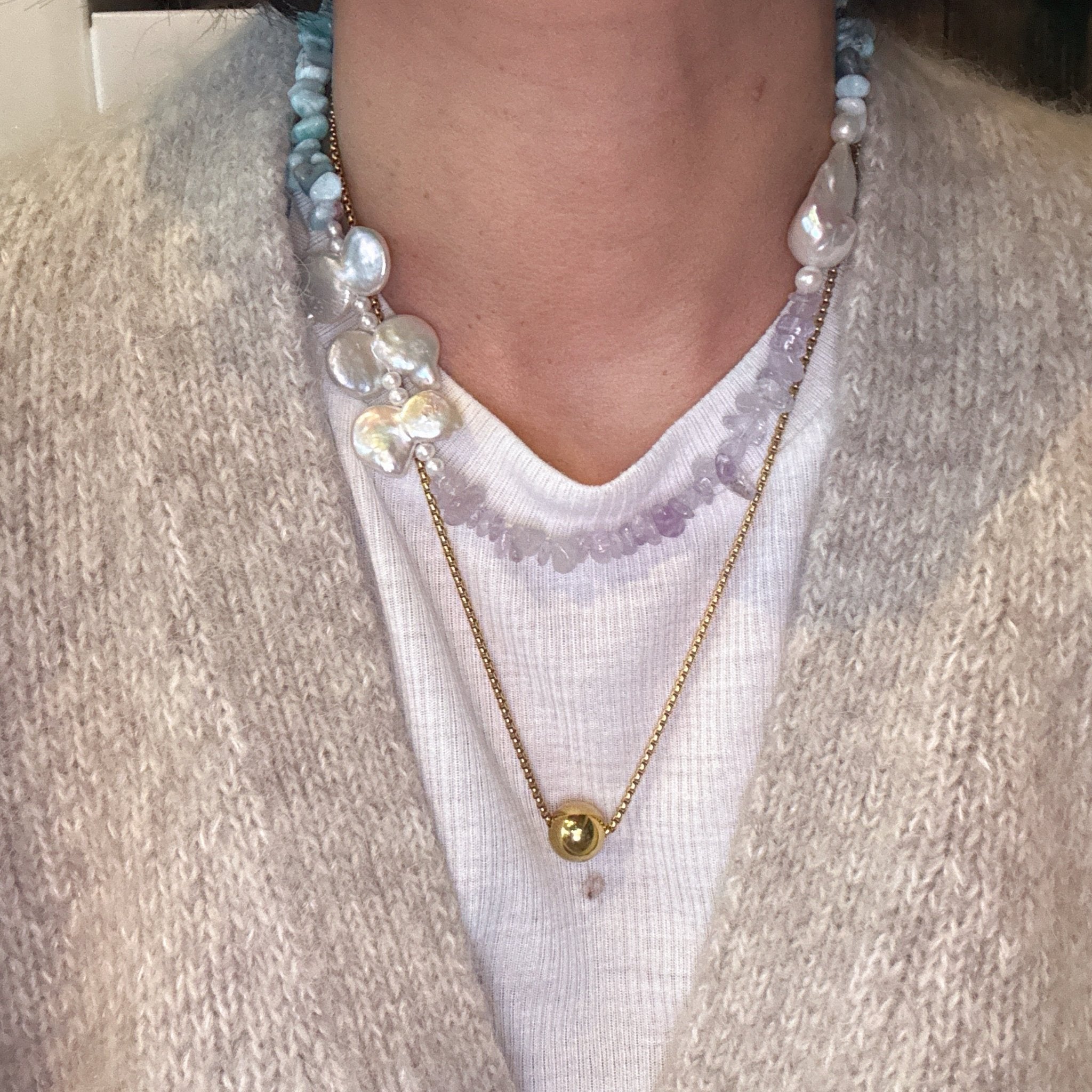 Model wearing Sea Flower – Larimar, Amethyst & Baroque Pearl Necklace