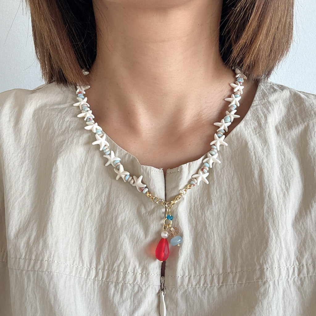 Model wearing Starfish Necklace