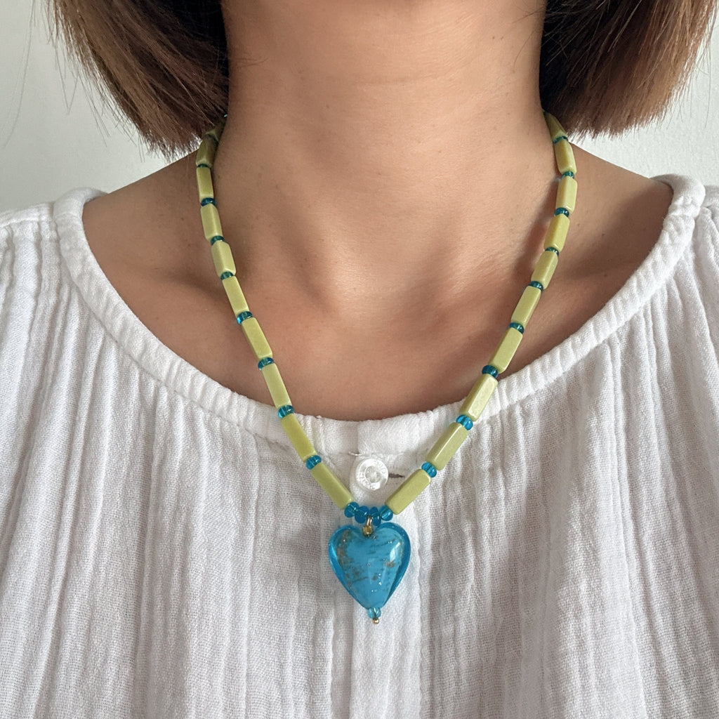 Model wearing Sunlit Heart Necklace